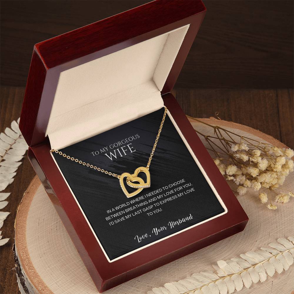 Interlocking Hearts Necklace—To my gorgeous wife, I'd save my last gasp to express my love to you